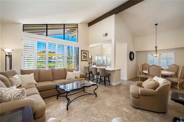28 Lost River Dr, Palm Desert, CA 92211 - living room with visible vents, baseboards, high vaulted ceiling, and beamed ceiling