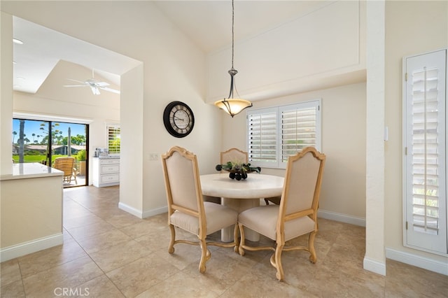 28 Lost River Dr, Palm Desert, CA 92211 - dining area featuring high vaulted ceiling, baseboards, a ceiling fan, and light tile patterned floors