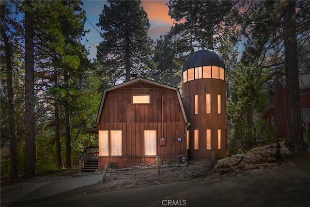 exterior space with a gambrel roof
