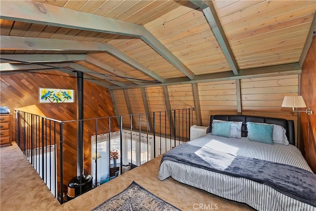 unfurnished bedroom with wooden ceiling, wood walls, lofted ceiling with beams, and carpet