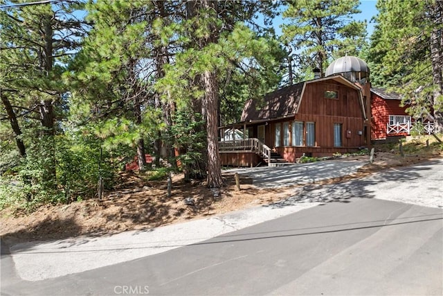 31867 Wagon Wheel Dr, Running Springs, CA 92382 - view of front facade with a gambrel roof