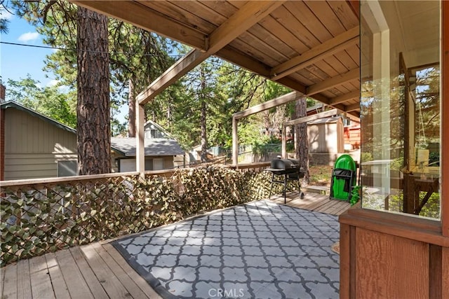 31867 Wagon Wheel Dr, Running Springs, CA 92382 - wooden deck with a storage shed and area for grilling