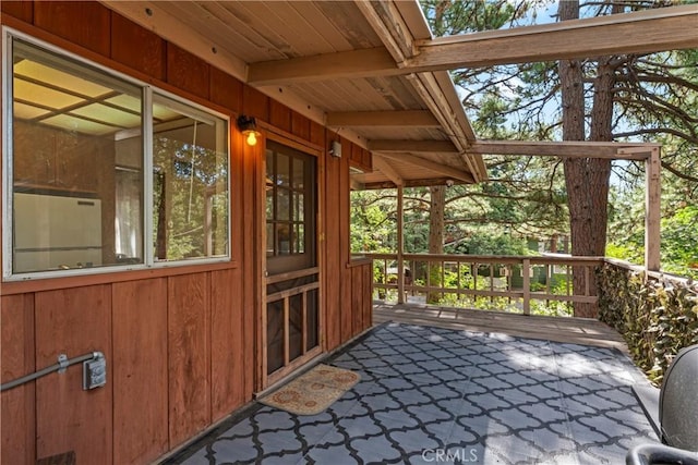 31867 Wagon Wheel Dr, Running Springs, CA 92382 - unfurnished sunroom with beamed ceiling