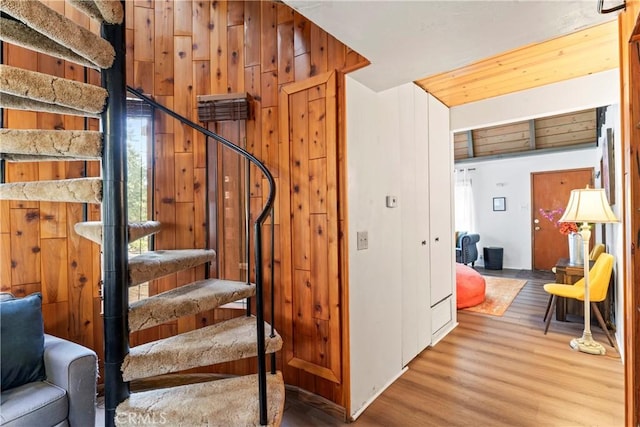 31867 Wagon Wheel Dr, Running Springs, CA 92382 - stairway featuring wood finished floors and wood walls