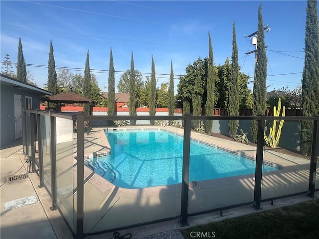 view of pool with a fenced backyard and a fenced in pool