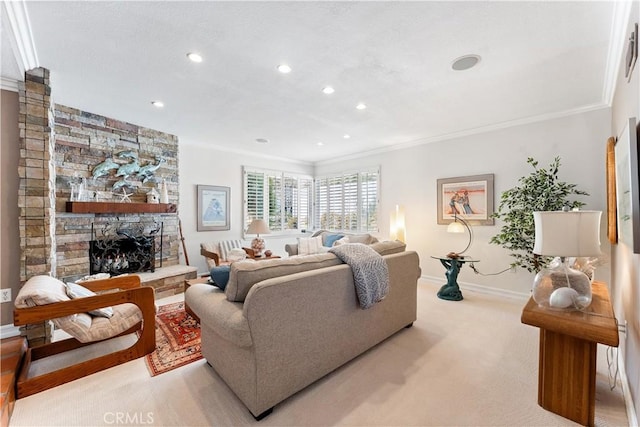 living area featuring a fireplace, ornamental molding, recessed lighting, light carpet, and baseboards