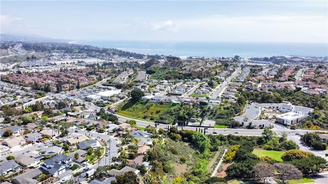 aerial view featuring a water view and a residential view
