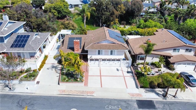 birds eye view of property with a residential view