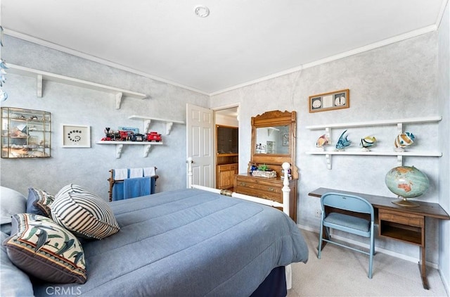 bedroom featuring crown molding and carpet