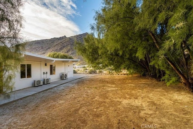 22495 Sierra Dr, Palm Springs, CA 92262 - view of yard featuring a mountain view and a patio area