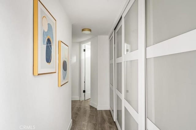 22495 Sierra Dr, Palm Springs, CA 92262 - corridor with baseboards and wood finished floors