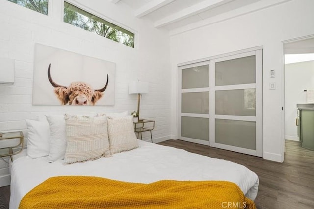 22495 Sierra Dr, Palm Springs, CA 92262 - bedroom featuring beamed ceiling, wood finished floors, and baseboards