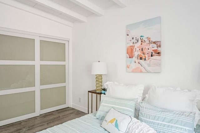 22495 Sierra Dr, Palm Springs, CA 92262 - bedroom featuring beam ceiling, wood finished floors, and baseboards