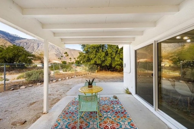 22495 Sierra Dr, Palm Springs, CA 92262 - view of patio featuring a mountain view and fence