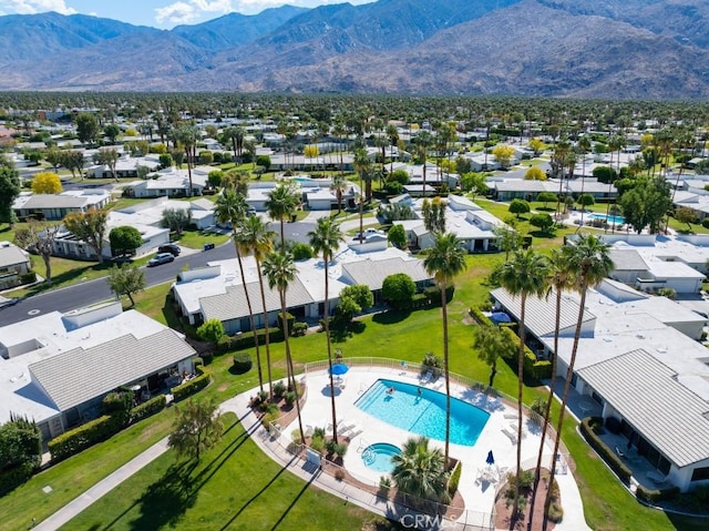 birds eye view of property with a residential view and a mountain view