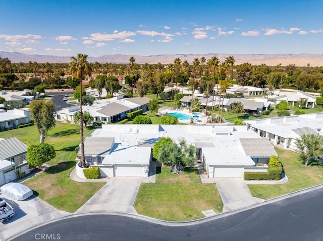 aerial view with a residential view and a mountain view