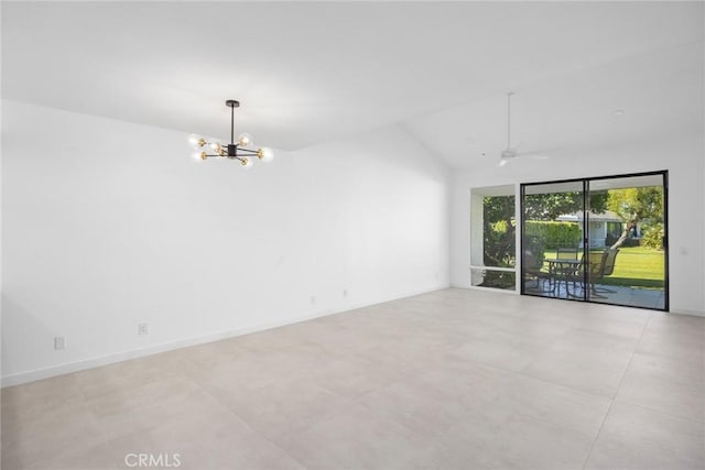 empty room featuring an inviting chandelier, baseboards, and vaulted ceiling