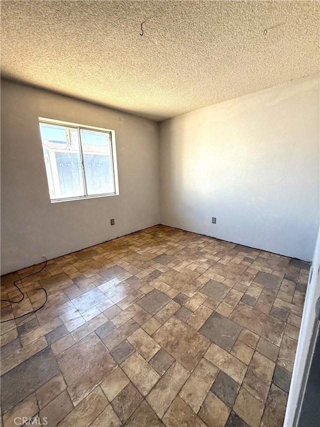 72183 Sunnyvale Dr Unit 29, Palms, CA 92277 - empty room featuring a textured ceiling