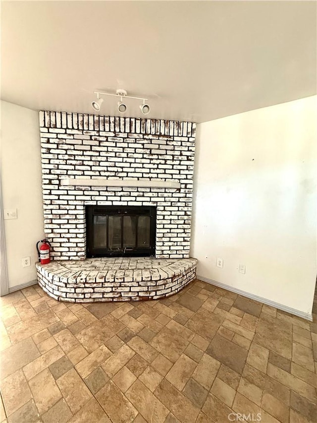 72183 Sunnyvale Dr Unit 29, Palms, CA 92277 - detailed view of a fire extinguisher, a fireplace, and baseboards