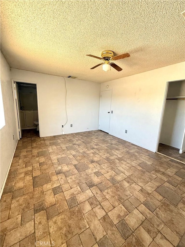 72183 Sunnyvale Dr Unit 29, Palms, CA 92277 - unfurnished bedroom featuring a textured ceiling and ceiling fan