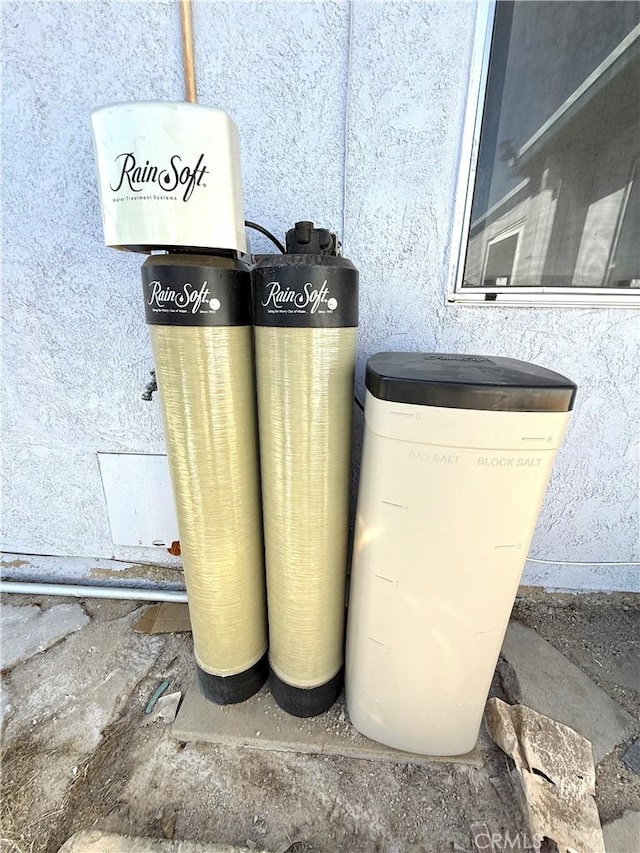 72183 Sunnyvale Dr Unit 29, Palms, CA 92277 - exterior view of stucco siding and a water softener