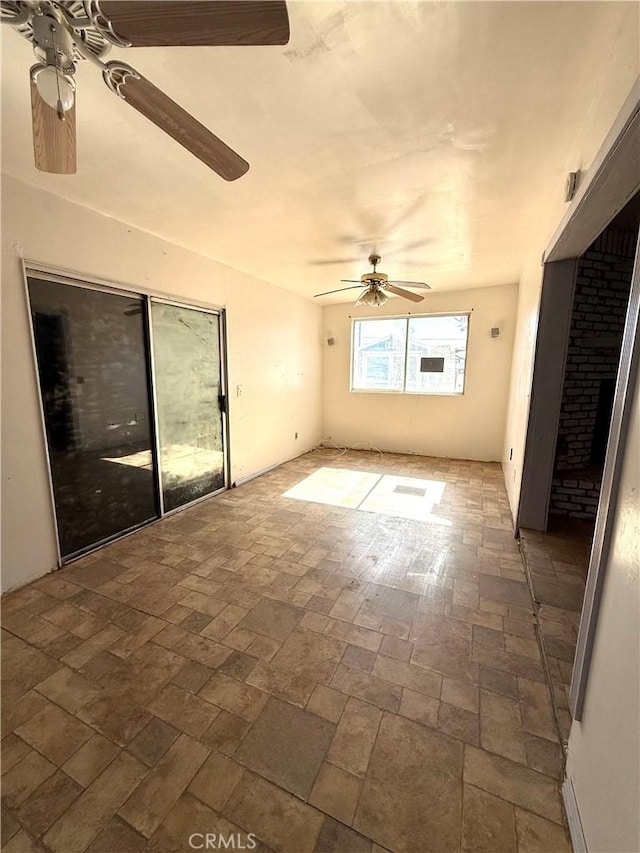 72183 Sunnyvale Dr Unit 29, Palms, CA 92277 - unfurnished room featuring a ceiling fan