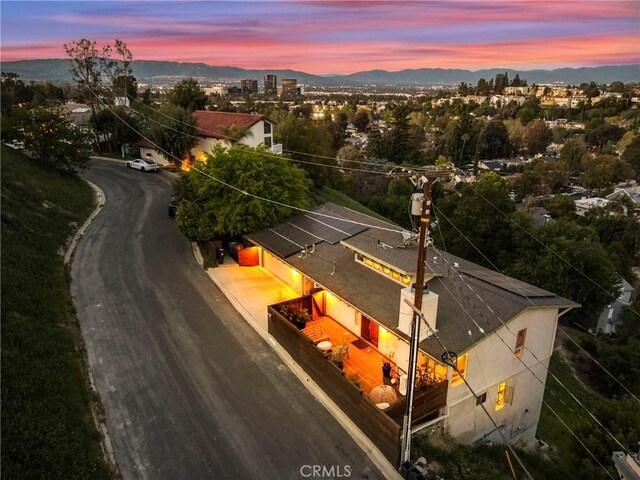5084 Llano Dr, Woodland Hills, CA 91364 - aerial view of property and surrounding area with a mountain backdrop