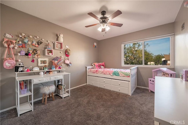 carpeted bedroom with baseboards and ceiling fan