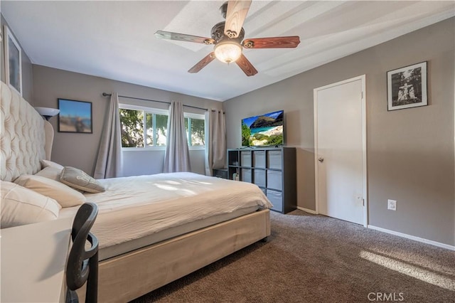 bedroom with baseboards, a ceiling fan, and carpet flooring