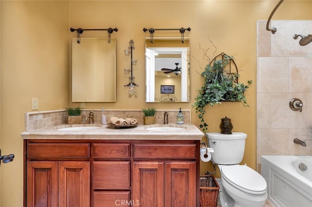 20711 Canyon Rd, Los Banos, CA 93635 - bathroom featuring shower / bath combination, toilet, a sink, and double vanity