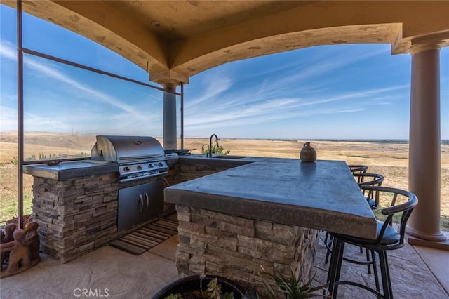 20711 Canyon Rd, Los Banos, CA 93635 - view of patio with exterior kitchen, outdoor wet bar, a sink, and area for grilling
