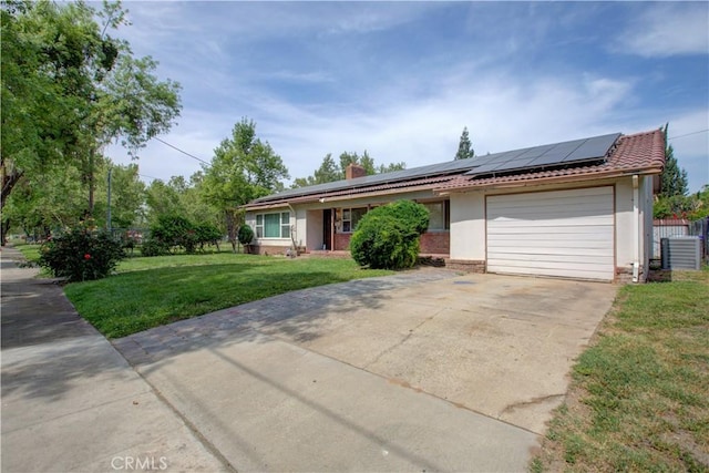 single story home with stucco siding, a front yard, fence, an attached garage, and driveway