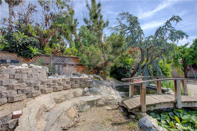 view of yard with fence