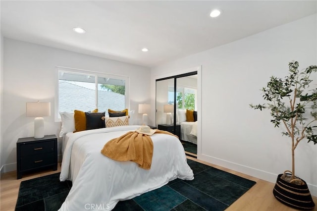 3130 E Craig Dr, Orange, CA 92869 - bedroom with wood finished floors, a closet, recessed lighting, and baseboards
