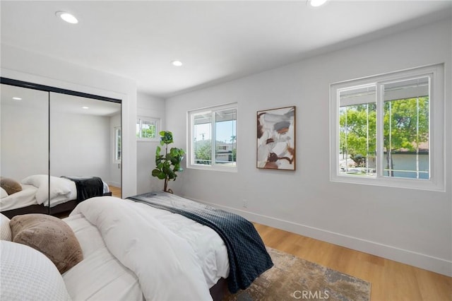 3130 E Craig Dr, Orange, CA 92869 - bedroom featuring baseboards, wood finished floors, recessed lighting, and a closet