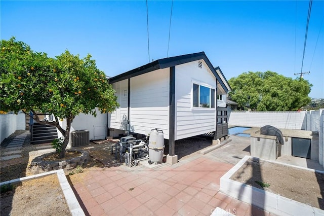 3130 E Craig Dr, Orange, CA 92869 - rear view of house featuring a patio area, cooling unit, a fenced backyard, and stairway