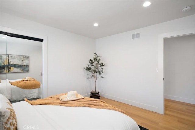 3130 E Craig Dr, Orange, CA 92869 - bedroom with light wood-type flooring, baseboards, and recessed lighting
