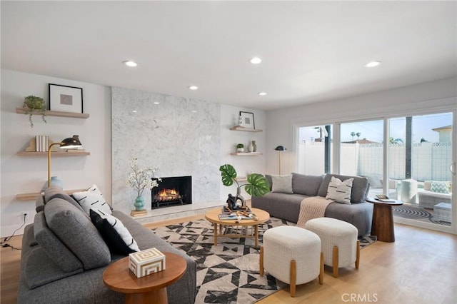 3130 E Craig Dr, Orange, CA 92869 - living area with wood finished floors, a premium fireplace, and recessed lighting