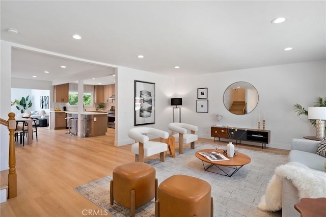 3130 E Craig Dr, Orange, CA 92869 - living area featuring light wood-style flooring, recessed lighting, and baseboards