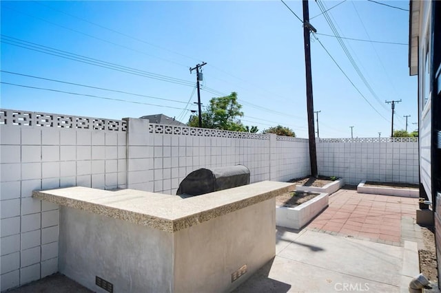 3130 E Craig Dr, Orange, CA 92869 - view of patio / terrace with a fenced backyard and a garden