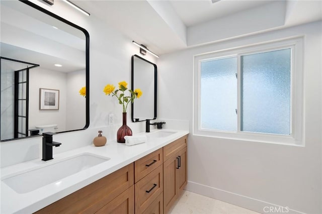3130 E Craig Dr, Orange, CA 92869 - full bath with double vanity, toilet, and baseboards