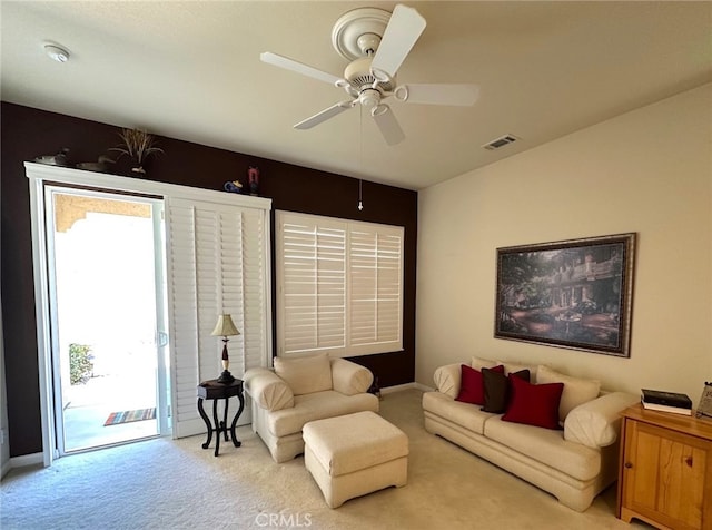 19472 Crystal Springs Ln, Apple Valley, CA 92308 - carpeted living area with a ceiling fan and baseboards