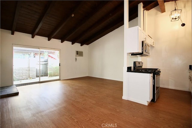unfurnished living room featuring baseboards, dark wood-style floors, beam ceiling, high vaulted ceiling, and wooden ceiling