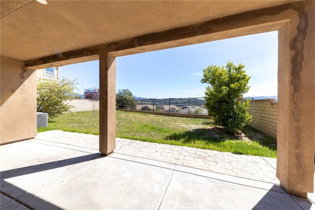 22364 Driftwood Ct, Saugus, CA 91350 - view of patio featuring central AC and a fenced backyard