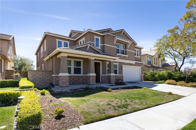 22364 Driftwood Ct, Saugus, CA 91350 - view of front of home with stucco siding, stone siding, a front lawn, an attached garage, and driveway