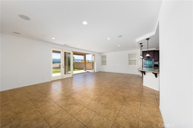 22364 Driftwood Ct, Saugus, CA 91350 - unfurnished living room with light tile patterned floors and recessed lighting