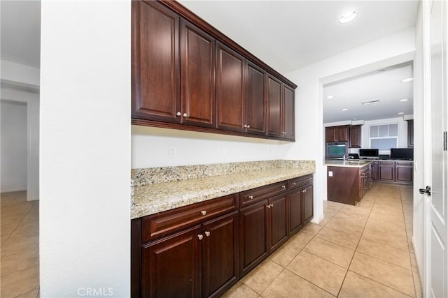 22364 Driftwood Ct, Saugus, CA 91350 - kitchen featuring light stone countertops, recessed lighting, light tile patterned floors, and a sink