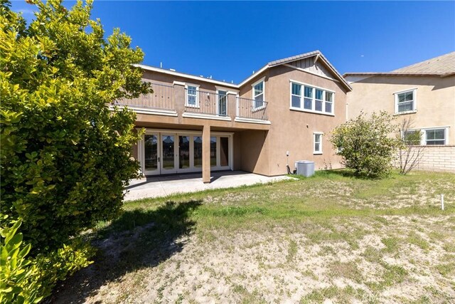 22364 Driftwood Ct, Saugus, CA 91350 - rear view of house with cooling unit, a patio, a balcony, french doors, and stucco siding
