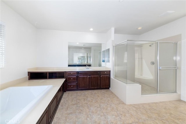 22364 Driftwood Ct, Saugus, CA 91350 - bathroom with recessed lighting, vanity, a bath, and a stall shower