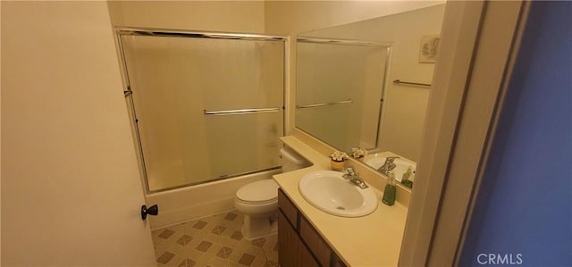 643 W Villa Chaparral Rd, San Jacinto, CA 92583 - full bath with toilet, vanity, and combined bath / shower with glass door